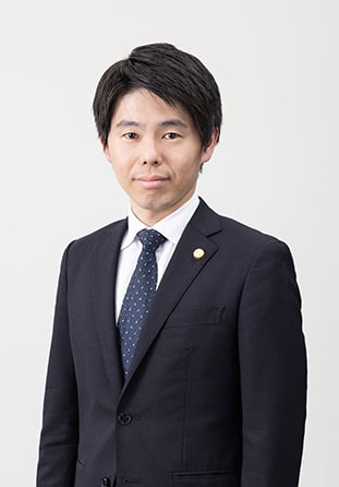弁護士粟津 正博